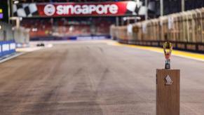 An F1 trophy sits on the track of a racing track in Singapore.