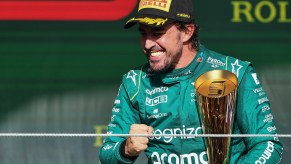 Fernando Alonso celebrates his podum finish at the 2023 Grand Prix of Brazil