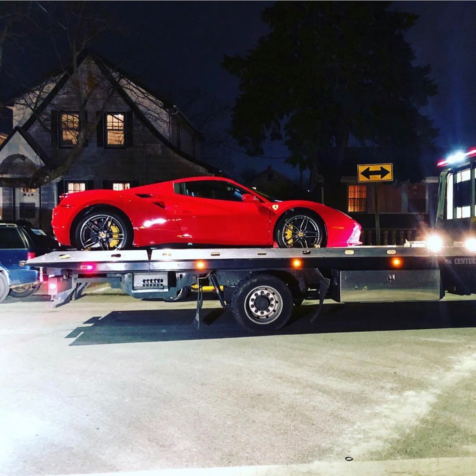 50 Cent's Ferrari 488 on a flatbed truck earned him a spot on the Ferrari blacklist. 