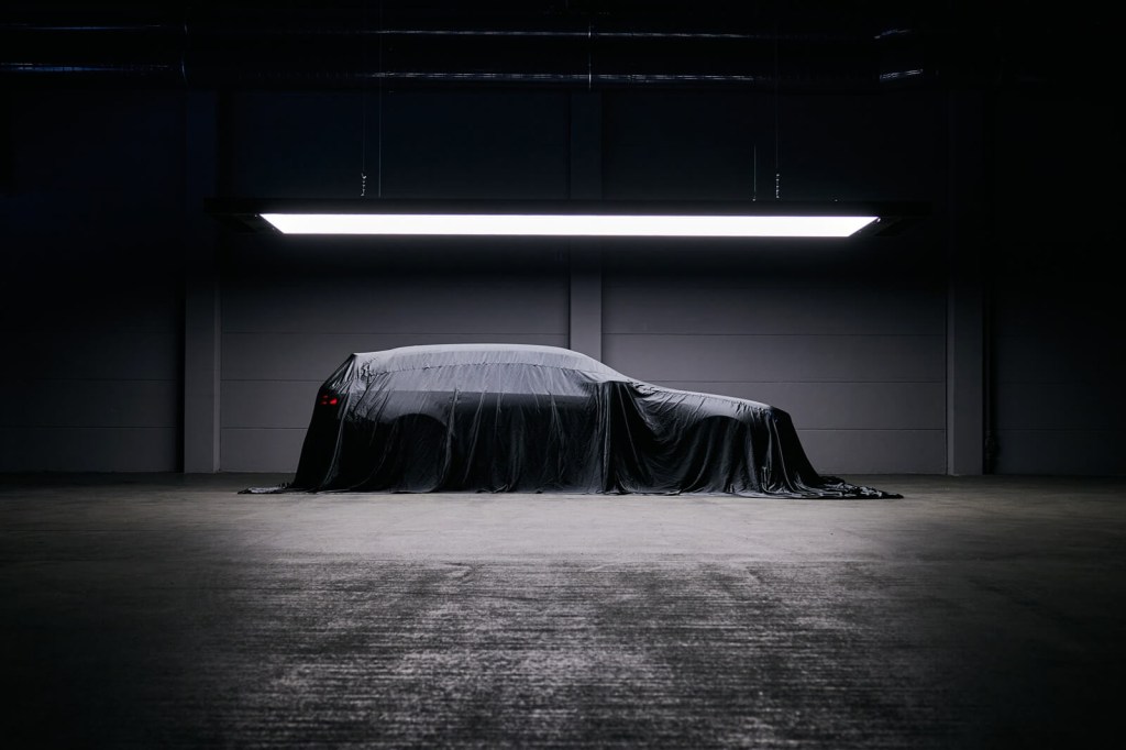 The new BMW M5 Wagon sits under wraps.
