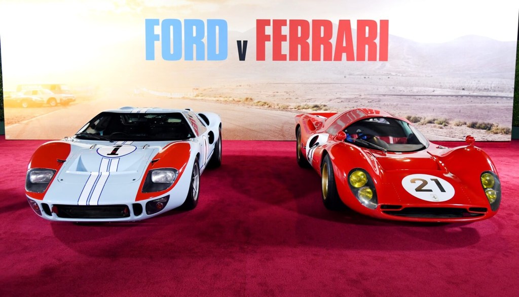 A display showcases a Ferrari P3 and Ford GT40 for one of the best racing rivalry movies: 'Ford v Ferrari'.
