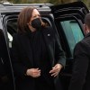 Vice President Kamala Harris stepping out of a Chevy Tahoe