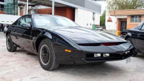 A KITT replica like the one from Knight Rider shows off its front end.