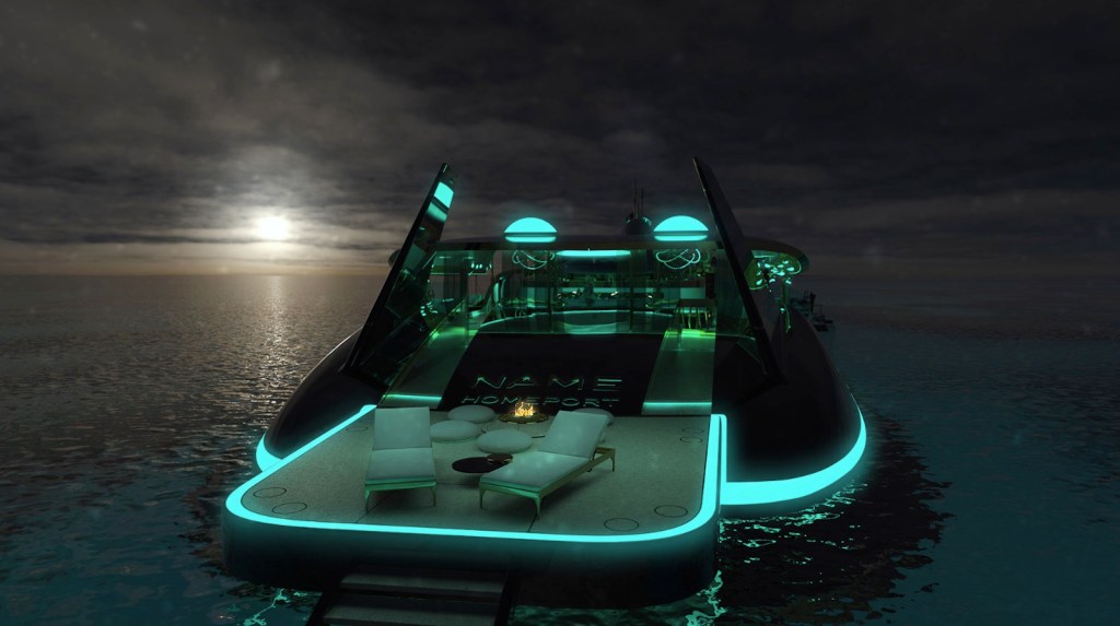 The back deck of a submarine yacht in front of the sunset.