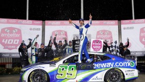 NASCAR driver Daniel Suarez celebrates Ambetter 400 win at Atlanta