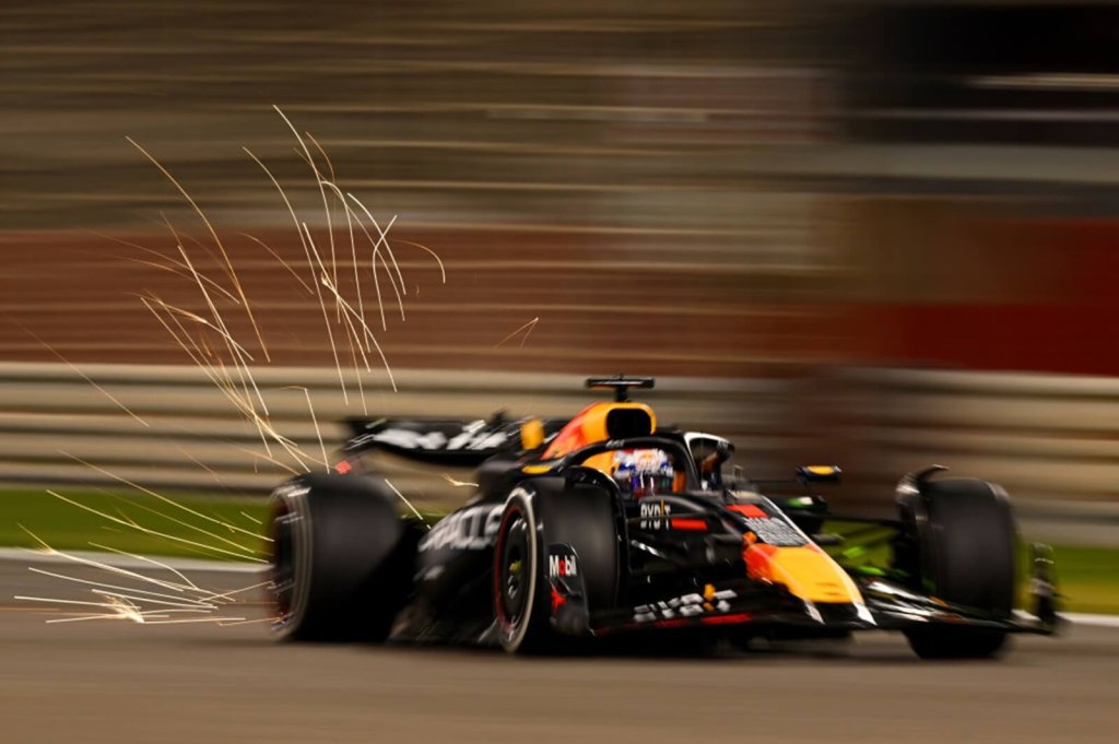 Sparks fly behind Max Verstappen in the new Red Bull RB20 F1 car.