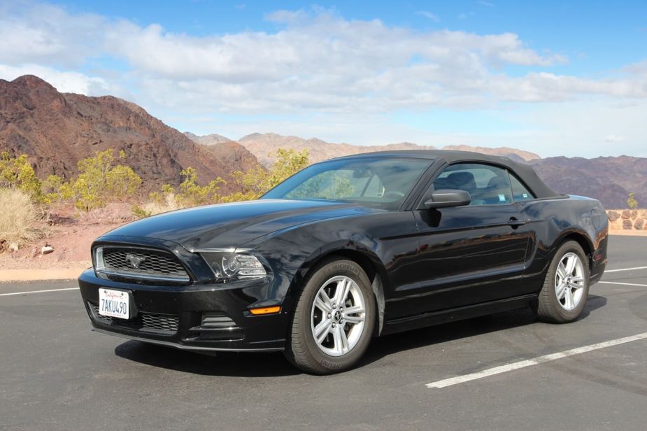 A convertible S197 Ford Mustang, like the generation from the "Fast & Furious" franchise.