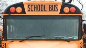 The windshield of a school bus.