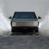 The Tesla Cybertruck splashing through water
