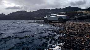 A Tesla Cybertruck defies rust concerns by parking next to the water.