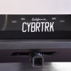 The "Bybrtrk" vanity plate on a Tesla Cybertruck parked in a museum