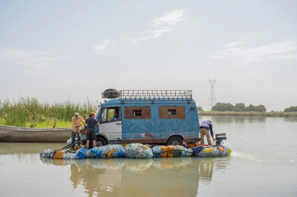 Richard Hammond, James May, and Jeremy Clarkson attempt a river crossing with a van in The Grand Tour: Sand Job.