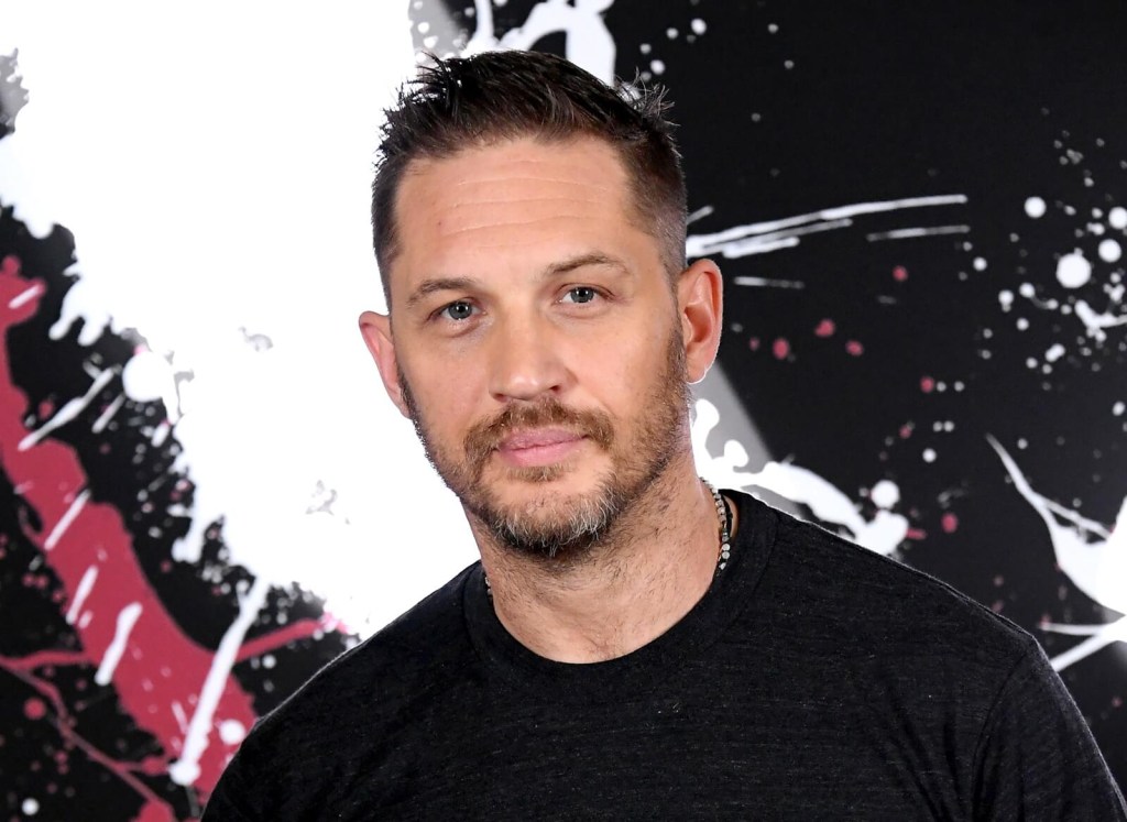 Tom Hardy, star of the 'Venom' franchise, promotes the movie wherein he rides a Ducati motorcycle. 