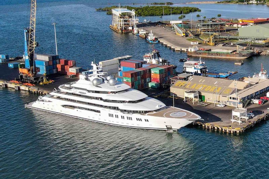 Super yacht parked at a shipping container dock in Fiji.
