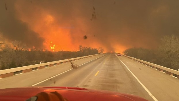 Watch Texas Firefighter Drive Truck Straight Through Wild Flames