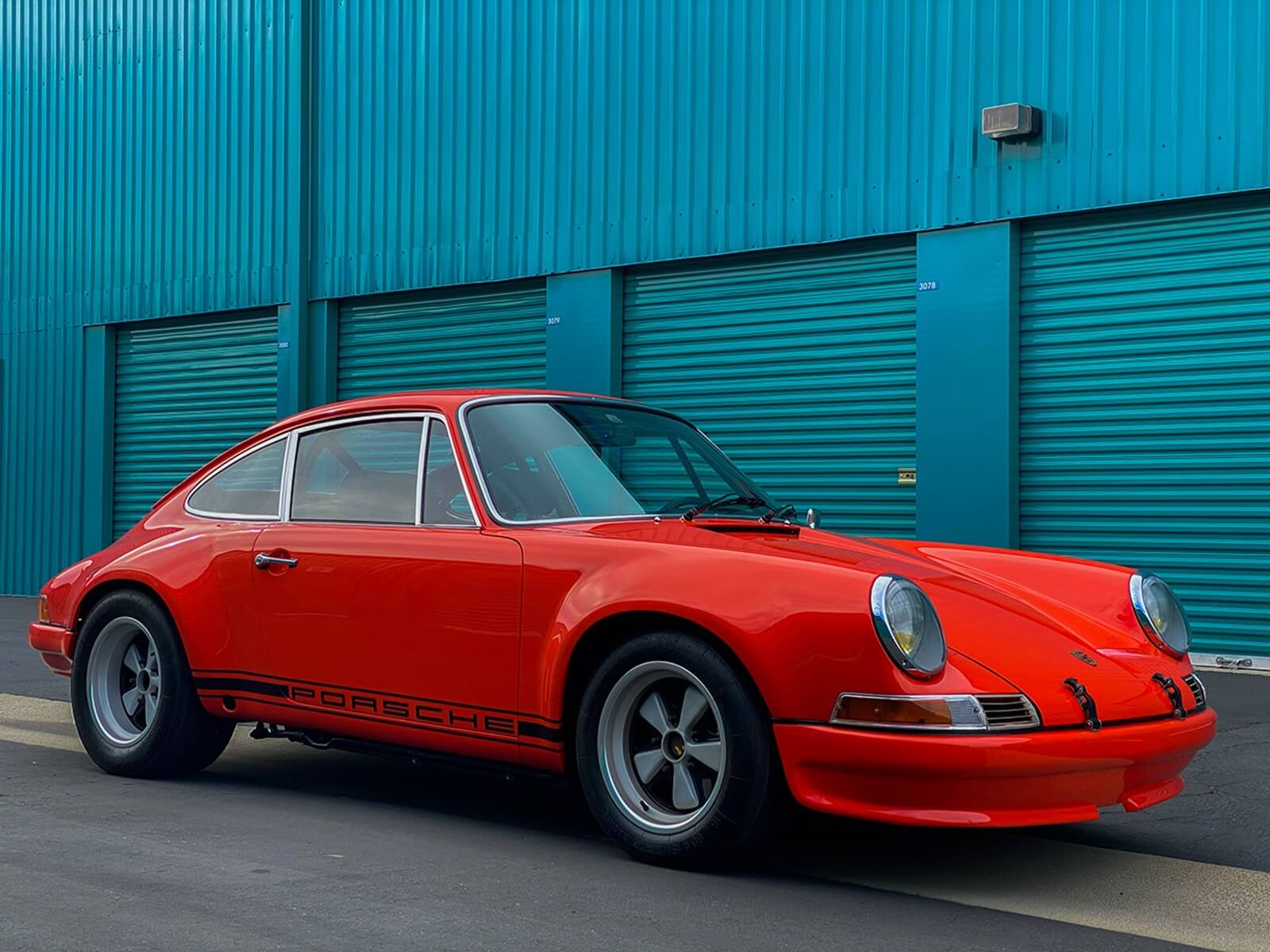 A red Porsche 911 EV conversion from Everrati.