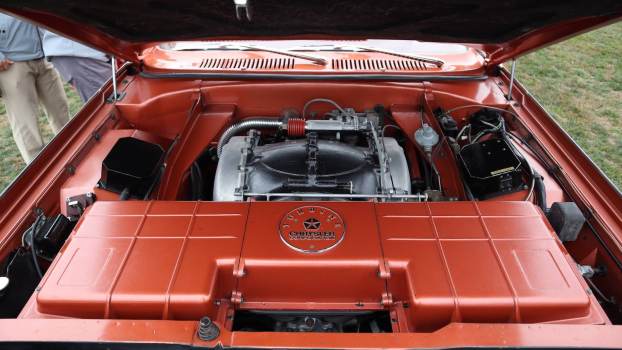 The air compressor and turbine engine under the hood of a 1963 Chrysler Turbine car.