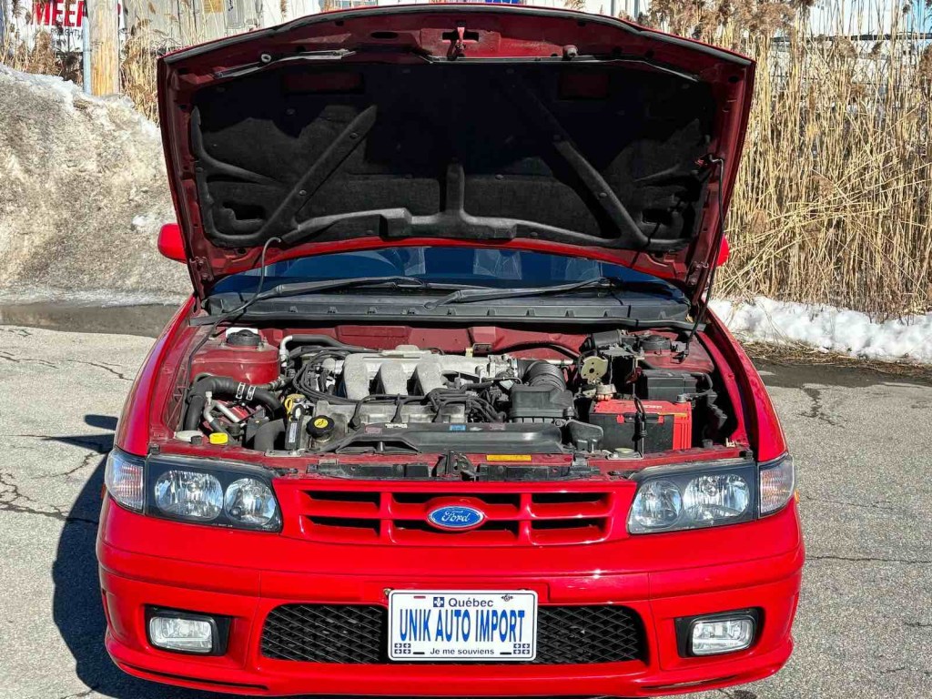 The V6 engine under the hood of a Japanese Market Ford Telestar station wagon.
