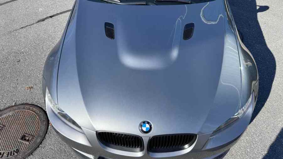 Hood. bulge on a gray V8-powered BMW M3 coupe from 2008.