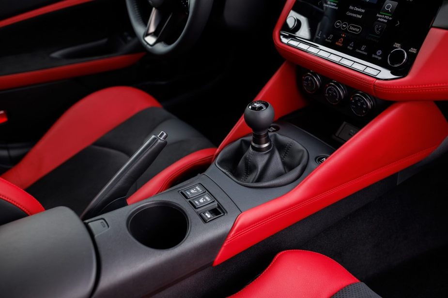 A 2023 Nissan Z sports car shows off its manual transmission shift knob.