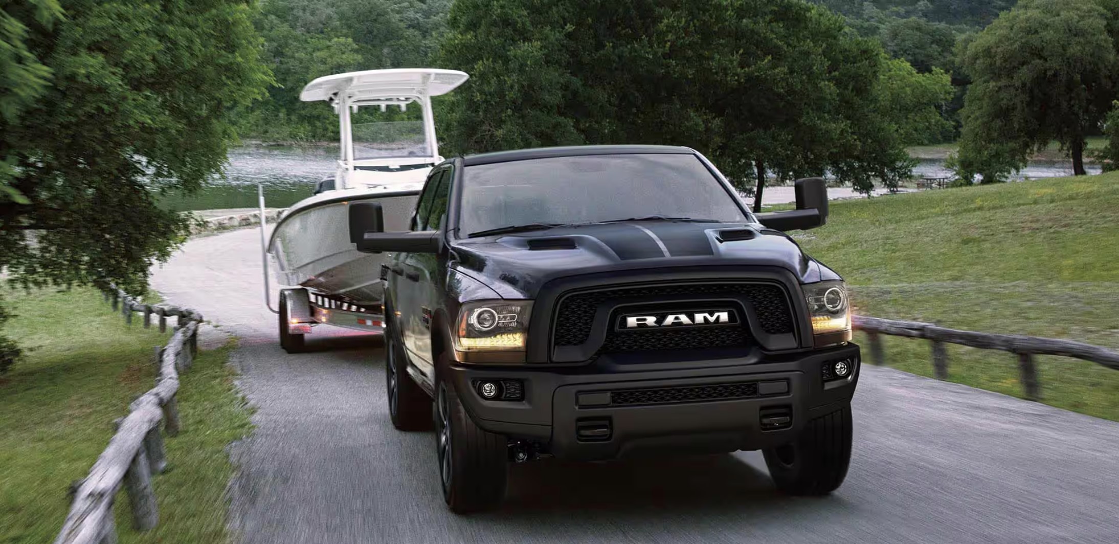 The 2023 Ram 1500 Classic pulling a boat