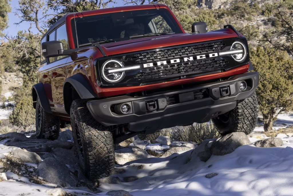 The 2024 Ford Bronco crawling over rocks