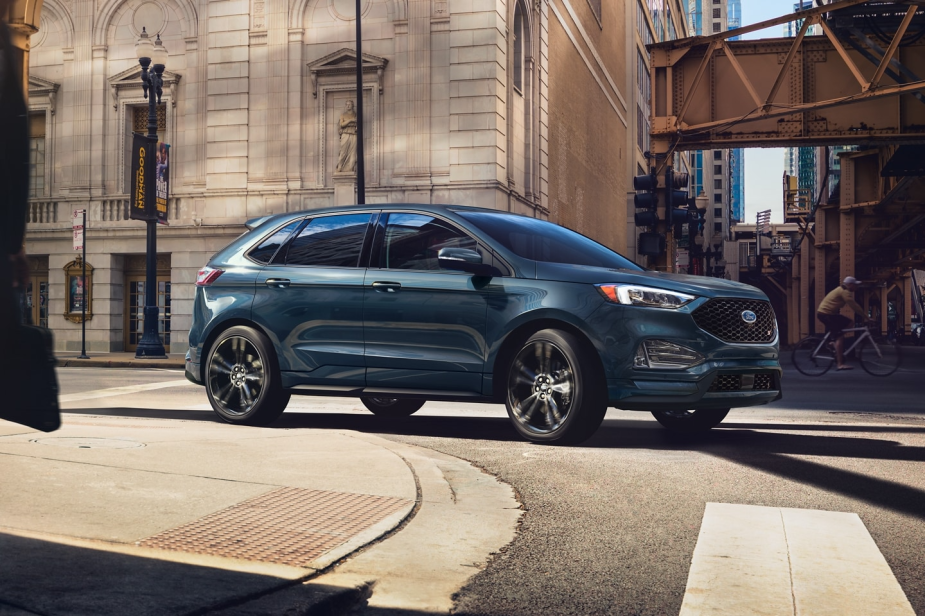 The 2024 Ford Edge driving in the city