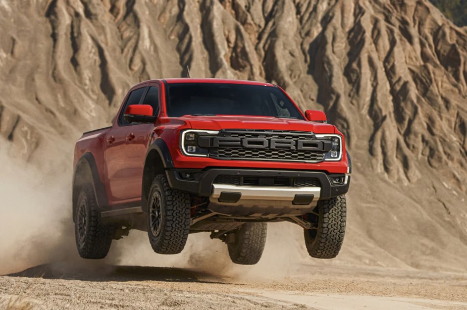 The 2024 Ford Ranger Raptor jumping in the desert