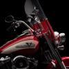 A red-and-white 2024 Harley-Davidson Hydra-Glide Revival shows off its old-school badges.