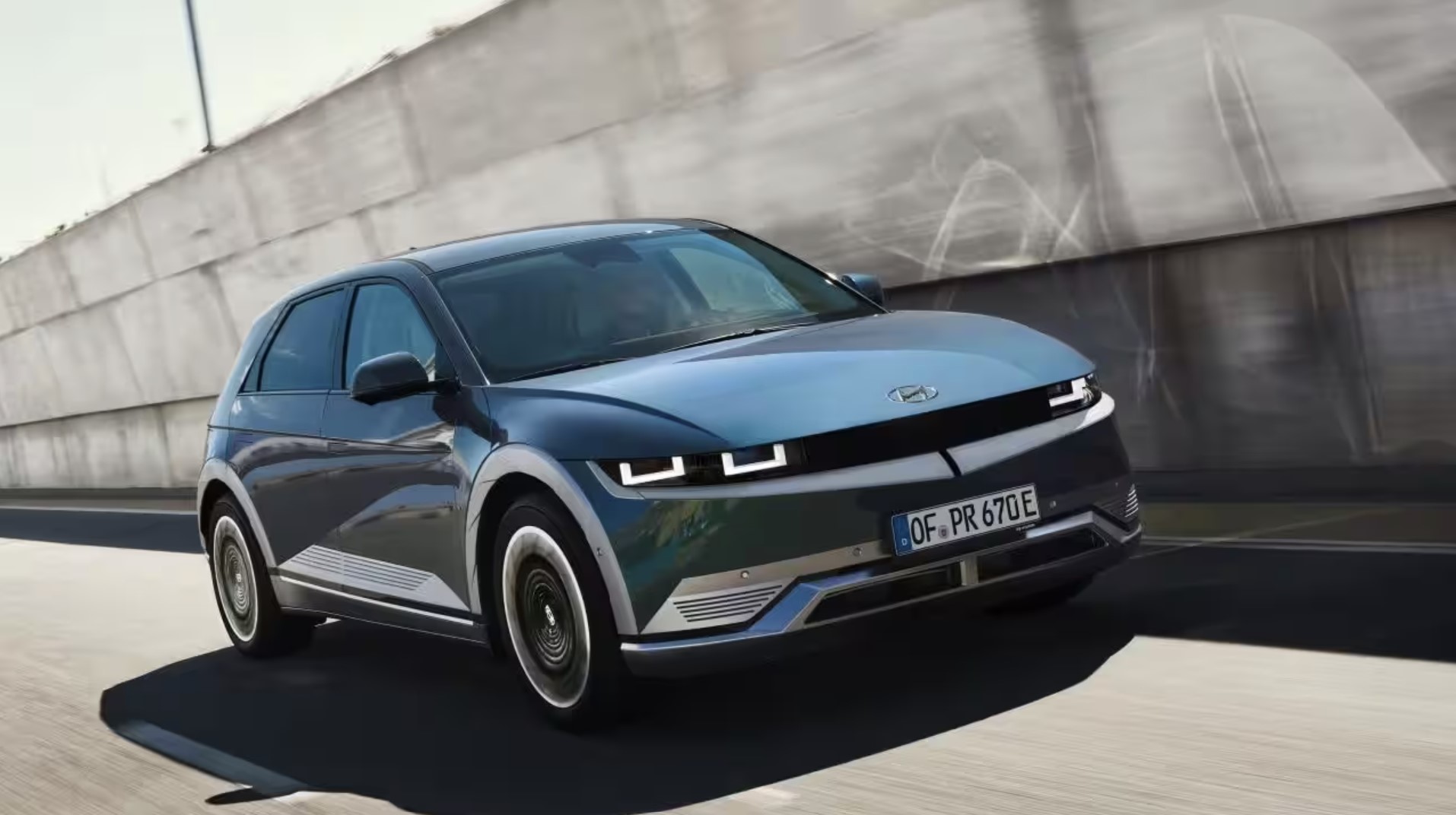 The 2024 Hyundai Ioniq 5 driving on a track 