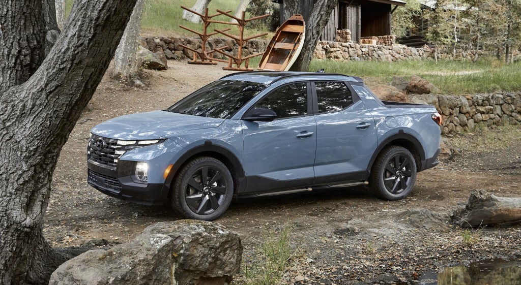 The 2024 Hyundai Santa Cruz off-roading in the woods