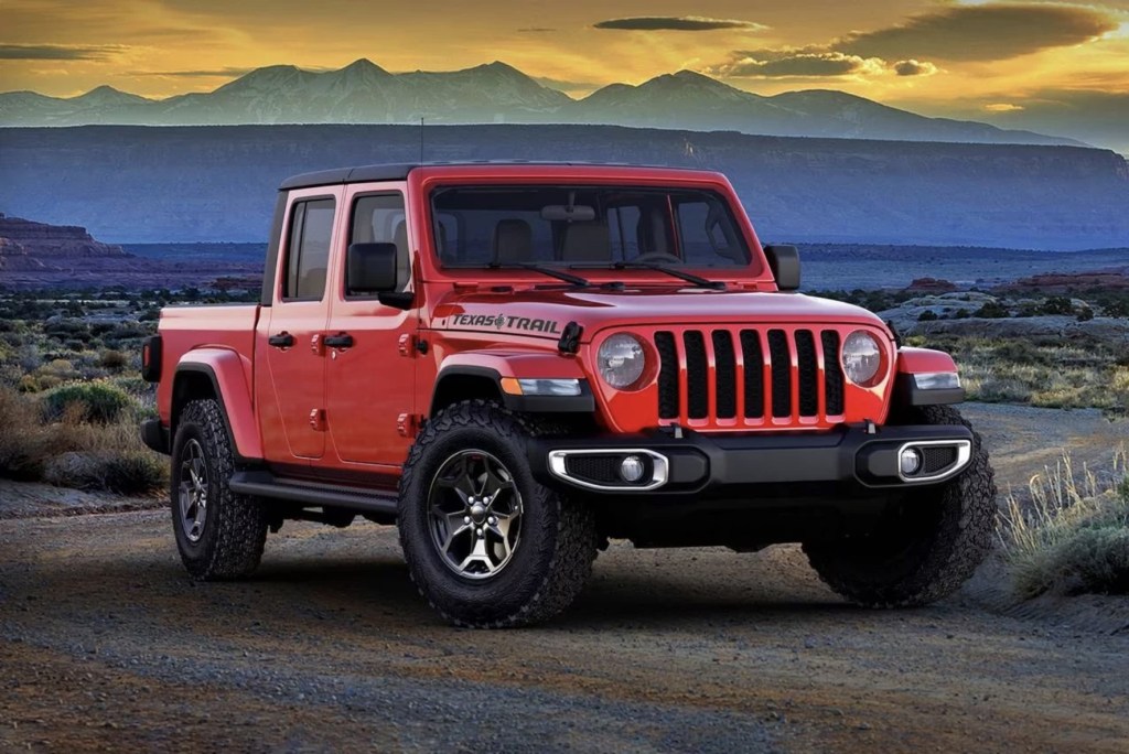 The 2024 Jeep Gladiator off-roading at dusk