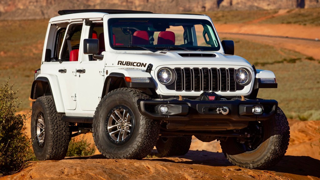 The 2024 Jeep Wrangler Rubicon 392 Final Edition climbing over rocks