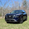 The 2024 Nissan Rogue off-roading in a field