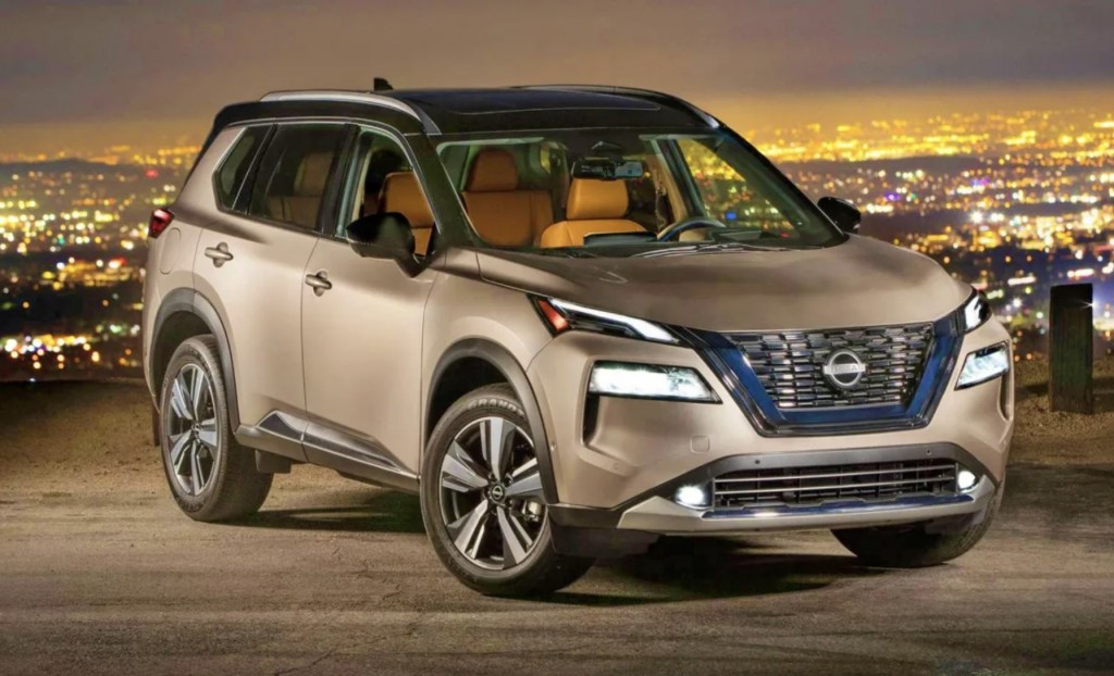 The 2024 Nissan Rogue parked near a city view