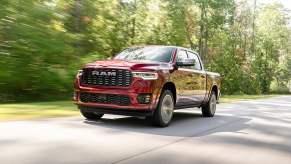 The 2025 Ram 1500 driving down the road