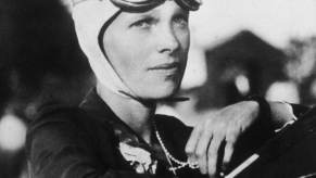 Amelia Earhart in the cockpit of an airplane in the 1920s.
