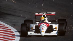 1980s Formula 1 car on the track.