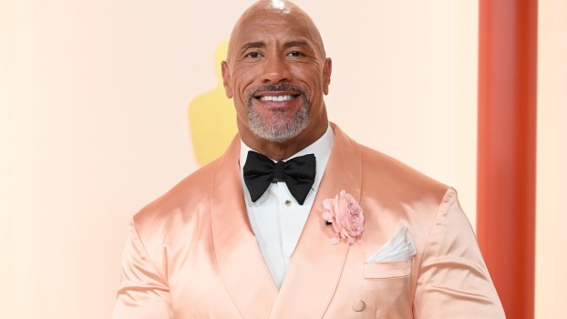 The Rock’s Present to His Dad: A Brand New Ford Explorer and Very Violent Christmas Story