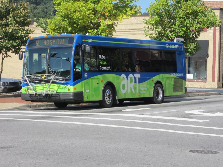 An electric bus traveling in Asheville, NC