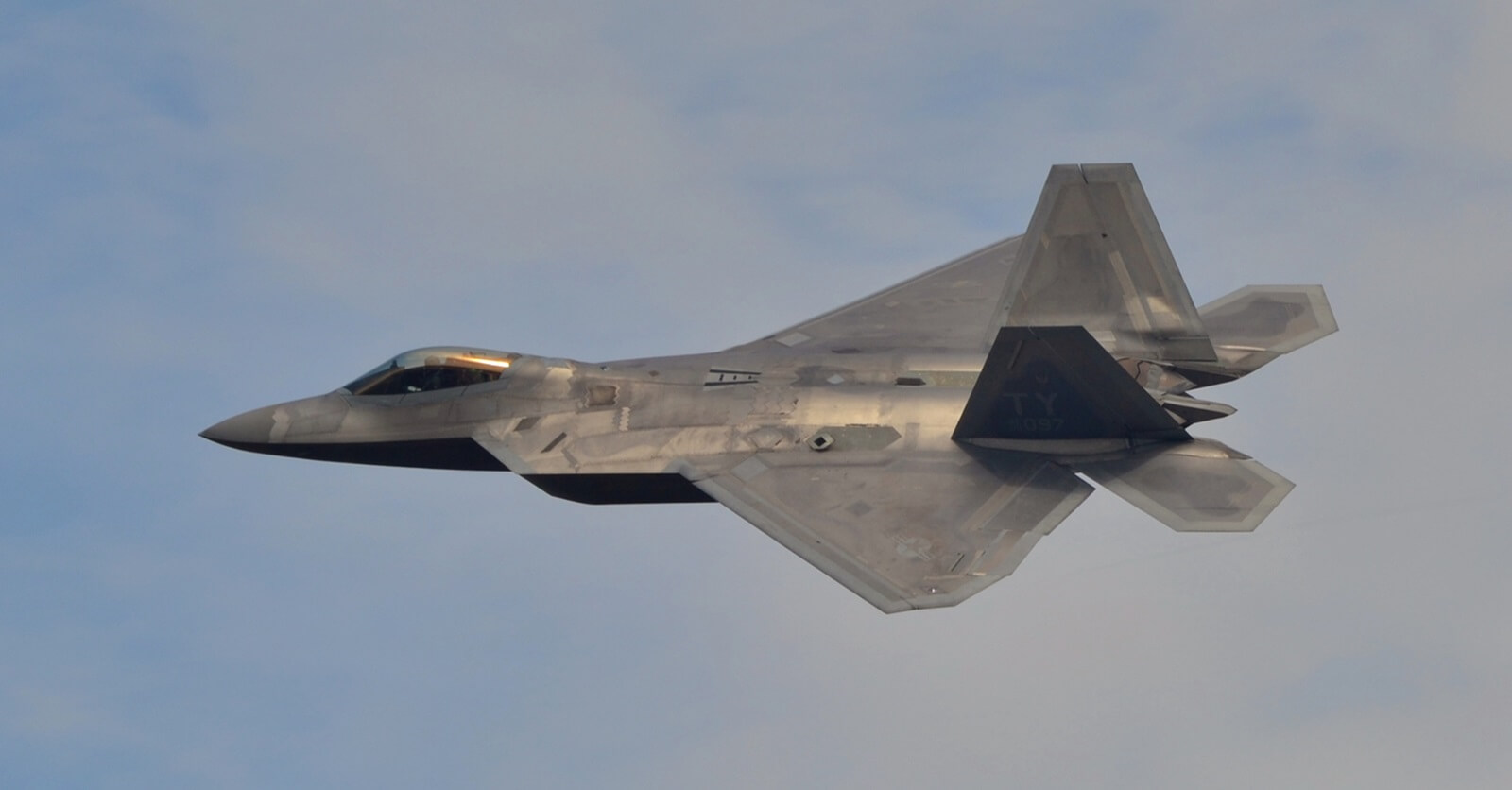 A Lockheed Martin F-22 Raptor in the air.