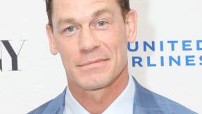 John Cena, a recent presenter at the Academy Awards, smiles at an event.