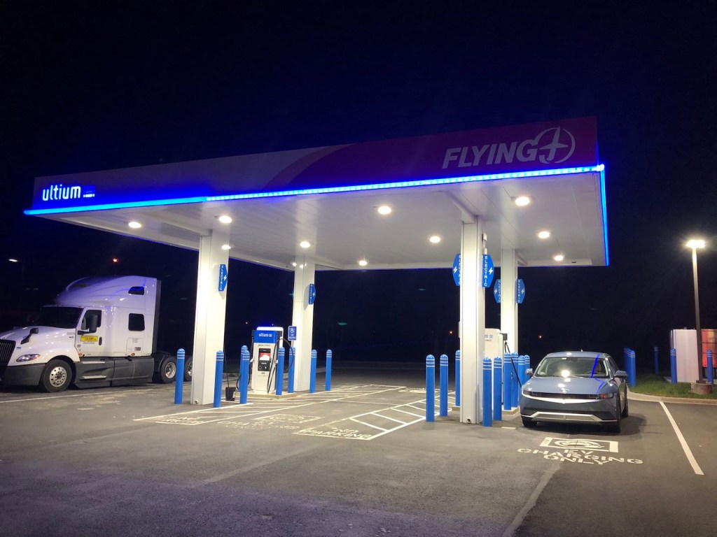 Ioniq 5 at a charging station at a truck stop.