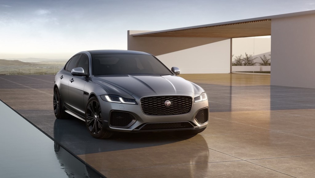 A gray Jaguar XF sedan shows off its front-end styling. 