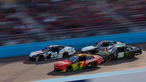 Justin Allgaier leads a pack at Phoenix during a NASCAR Xfinity Series race