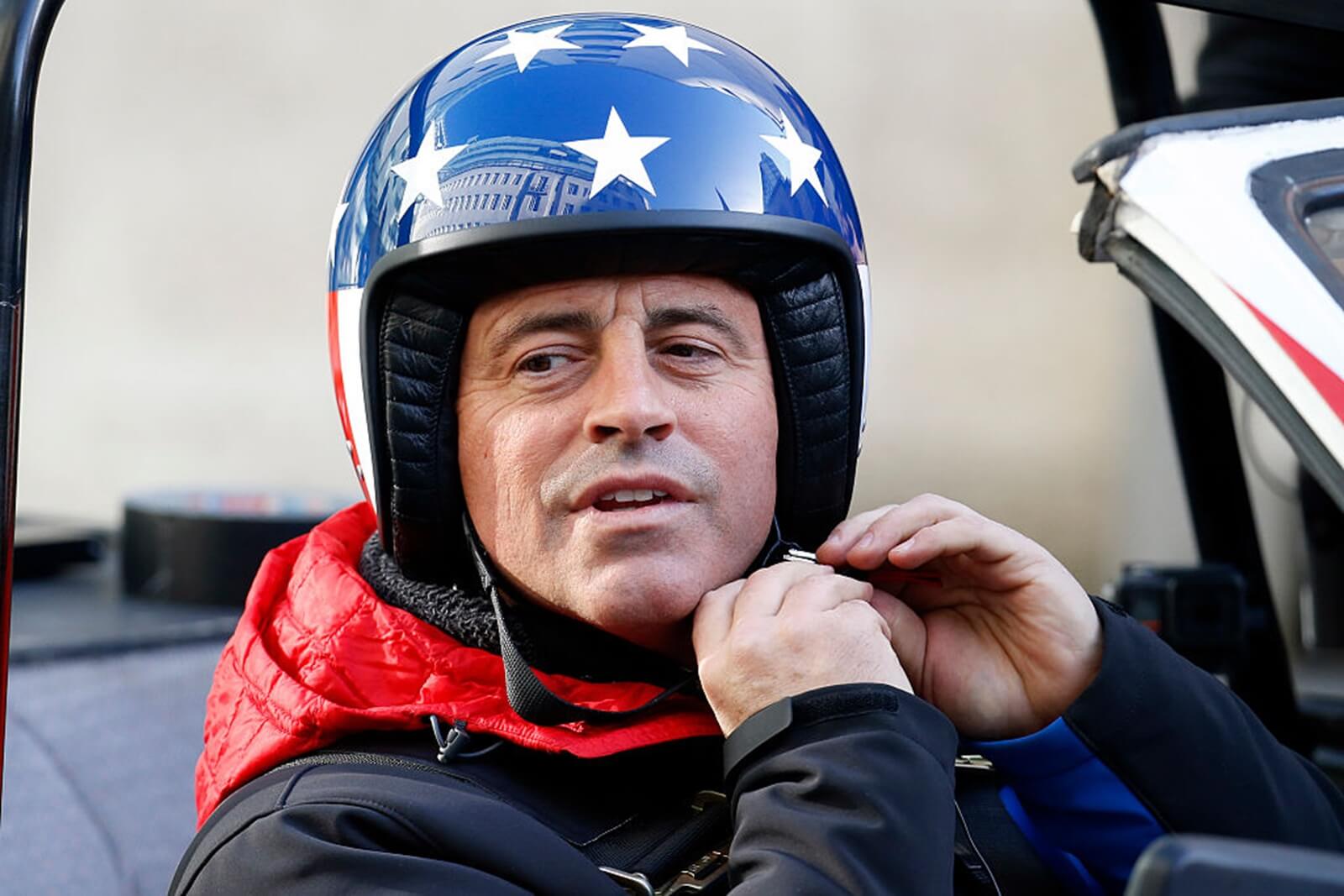 Friends star Matt LeBlanc puts on his helmet on the set of Top Gear. 