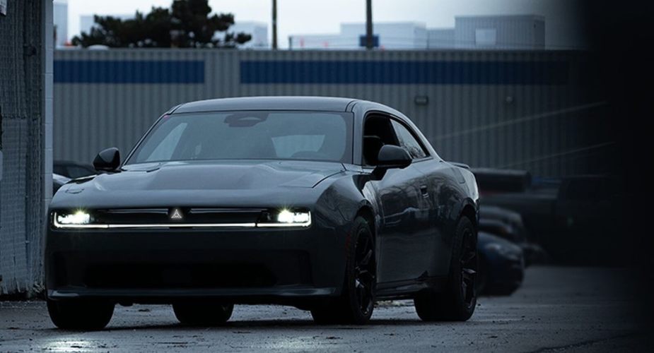A new black Dodge Charger, a competitor for the Ford Mustang, shows off its front-end styling.