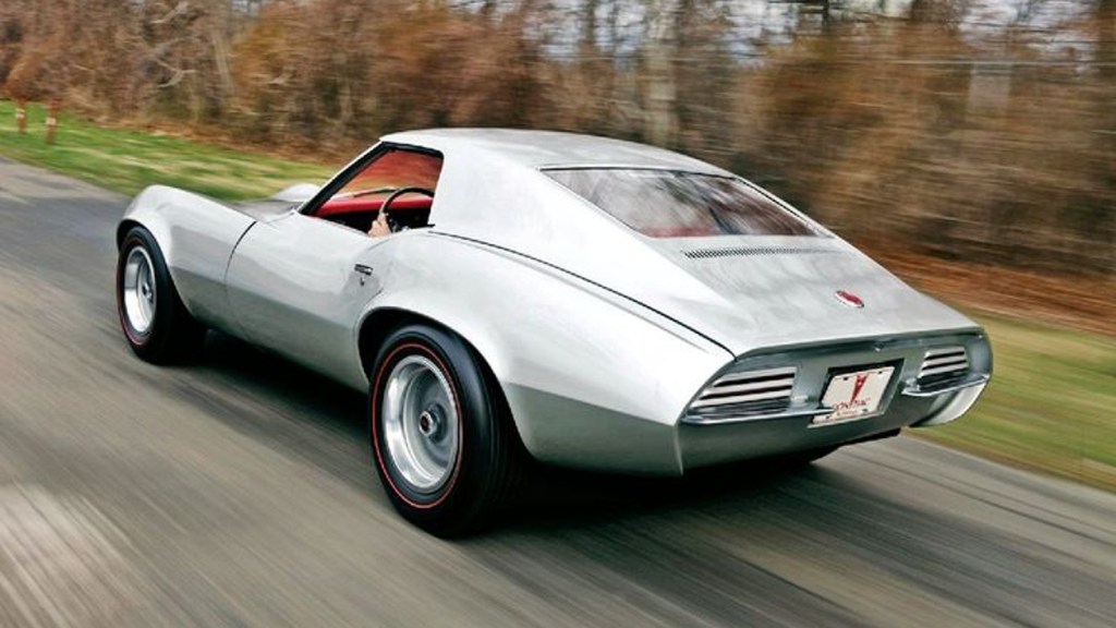 Pontiac Banshee Concept sports car testing on a road.