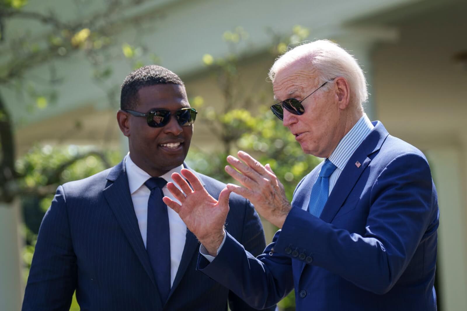 President Joe Biden talks to EPA Administrator Michael Regan ahead of new regulations. 