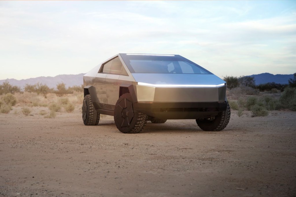 The Tesla Cybertruck off-roading in sand